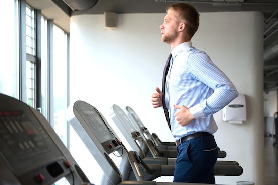 Businessman Exercising In Gym
